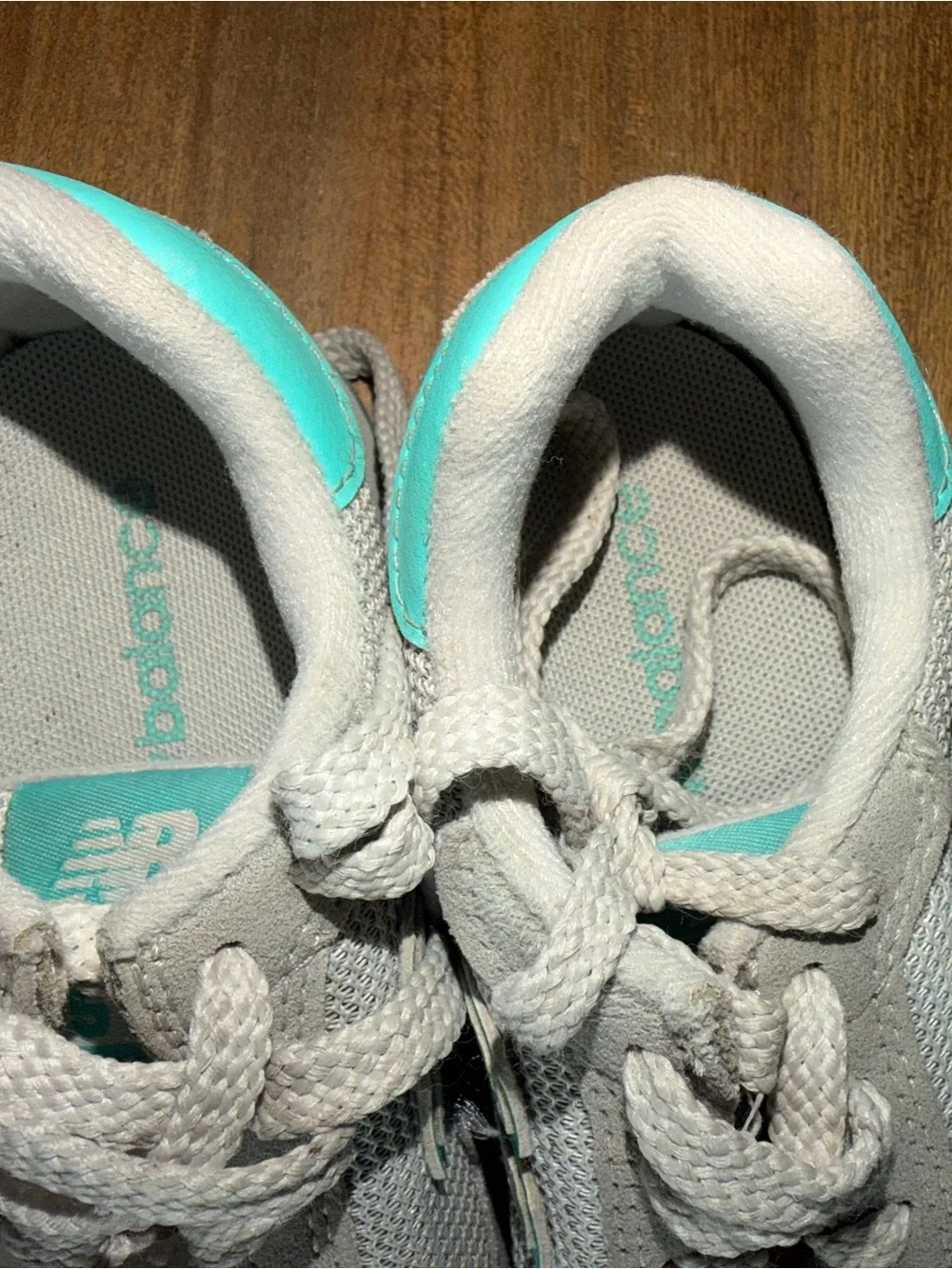New Balance Women's Beige Sneakers with Teal Accent